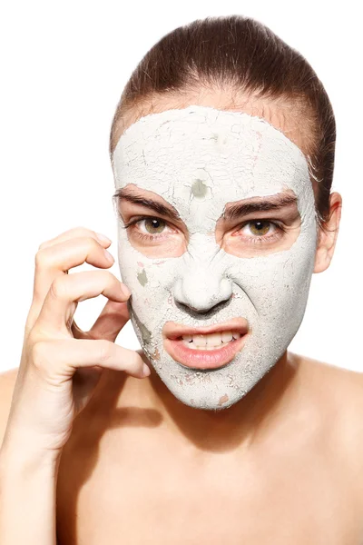 Ragazza in maschera con argilla verde — Foto Stock