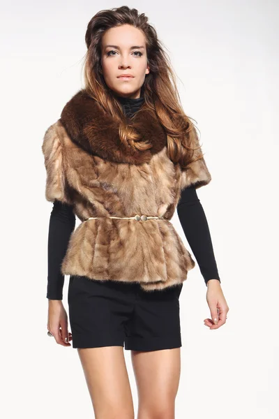 Young lady in a stylish fur — Stock Photo, Image