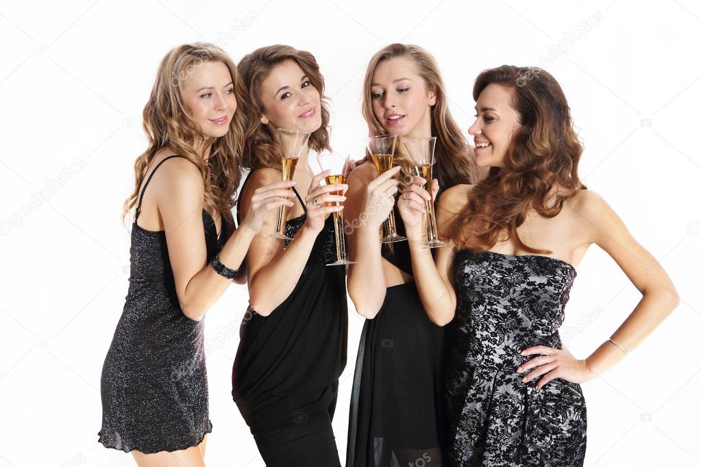 Group of sexy young women toasting with champagne