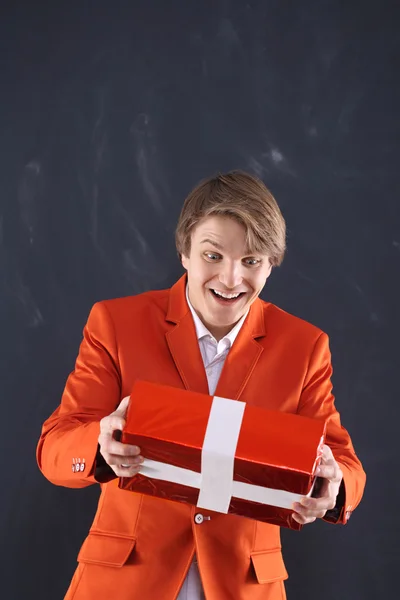 Man grabs a gift — Stock Photo, Image