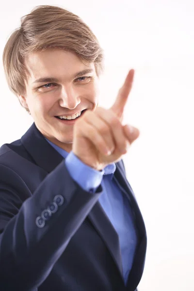 Boy in a blue suit presses the finger on the screen — Stock Photo, Image