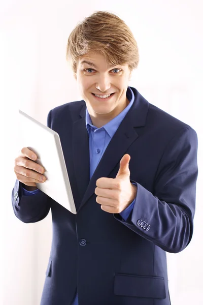 Happy office worker with a tablet — Stock Photo, Image