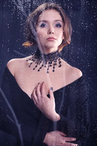 Glamour necklace-portrait of a woman in black — Stock Photo, Image