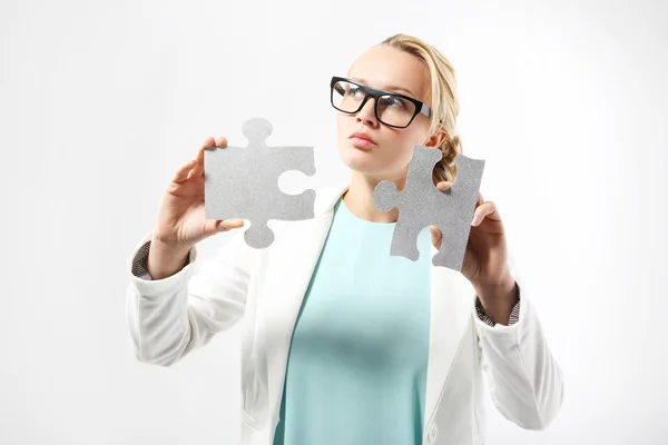 Silver puzzle - solving the problem — Stock Photo, Image
