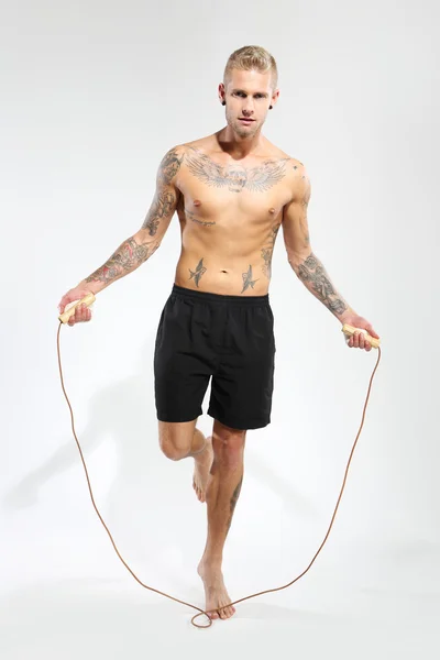 Jumping rope exercises with jump rope — Stock Photo, Image