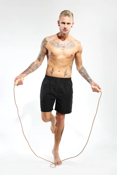 Jumping rope exercises with jump rope — Stock Photo, Image