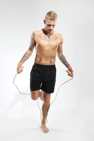 Jumping rope exercises with jump rope — Stock Photo, Image