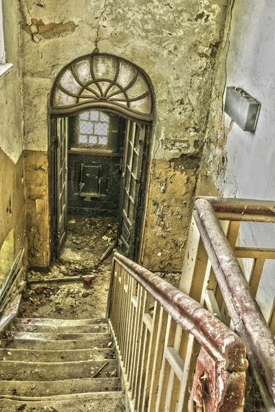 Stairway in an abandoned and ruined building Stock Photo