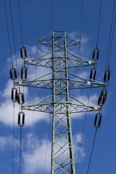 High voltage power pole with Blue Sky field — Stock Photo, Image