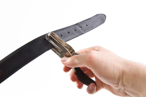 Adding Another Hole to a Belt — Stock Photo, Image