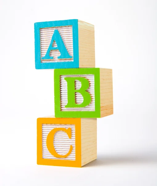 Wooden ABC blocks Stock Photo by ©vividpixels 19043575