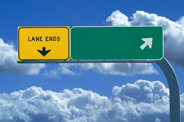 Blank freeway sign in blue cloudy skies — Stock Photo, Image