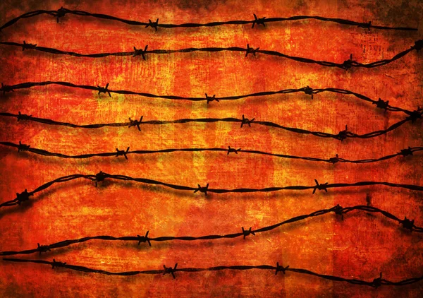Barbed Wire background over red — Stock Photo, Image