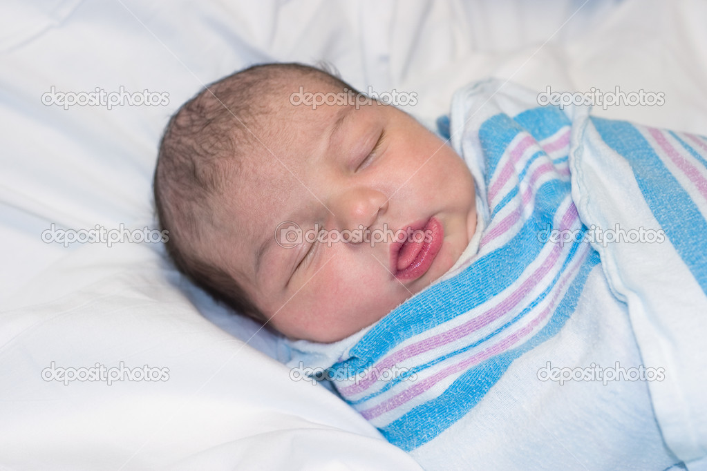 Newborn Resting with Funny Expression
