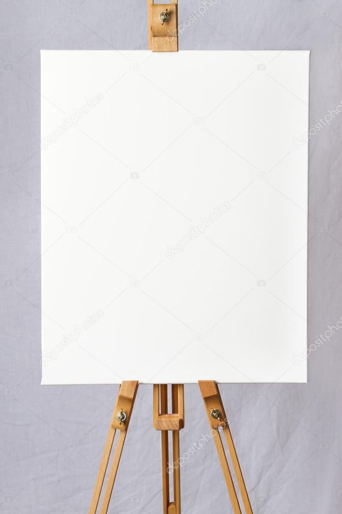 Blank white canvas on an easel