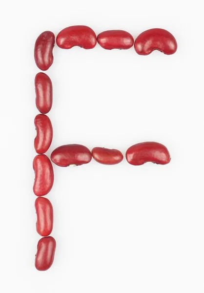 Letter F made of red bean on white background — Stock Photo, Image