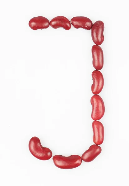 Letter J made of red bean on white background — Stock Photo, Image