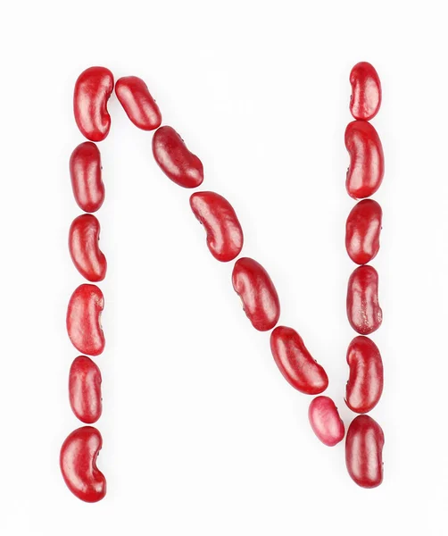 Letter N made of red bean on white background — Stock Photo, Image