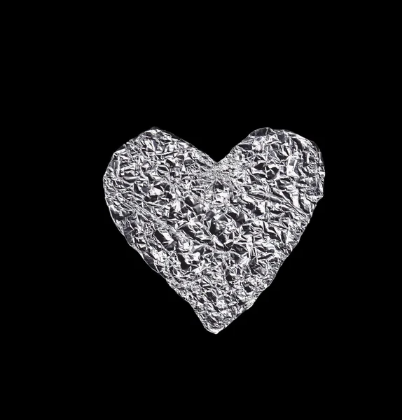 Aluminum heart isolated on black — Stock Photo, Image