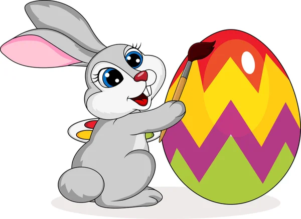 Desenho animado bonito de coelho pintando um ovo de Páscoa — Vetor de Stock