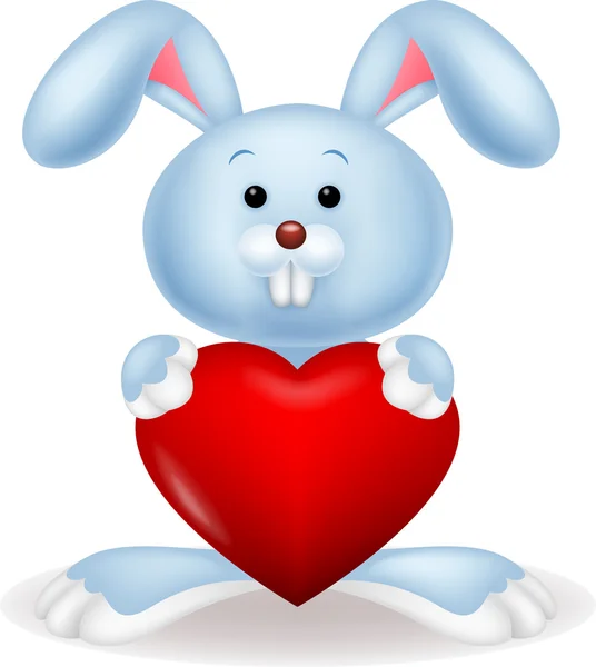 Caricature de lapin avec coeur rouge — Image vectorielle