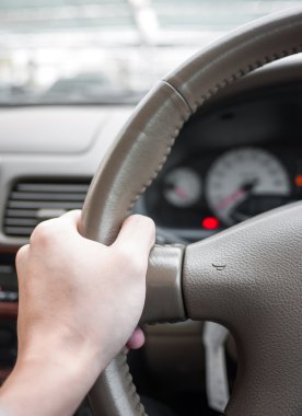 Correct hand position for holding a steering wheel clipart