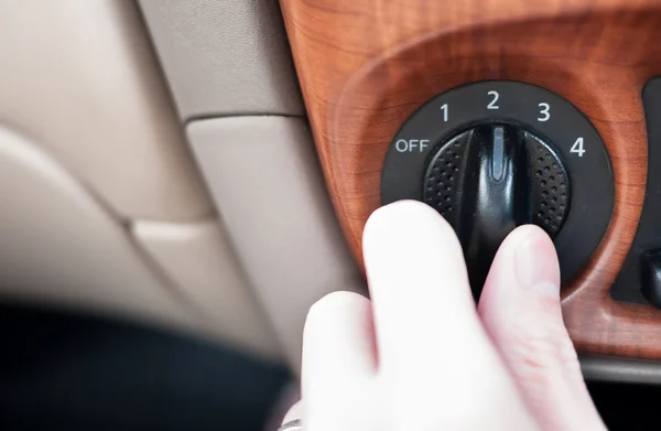 Hand adjusting air regulation level — Stock Photo, Image