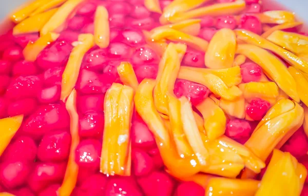 Red ruby-like chestnut with jackfruit in syrup — Stock Photo, Image