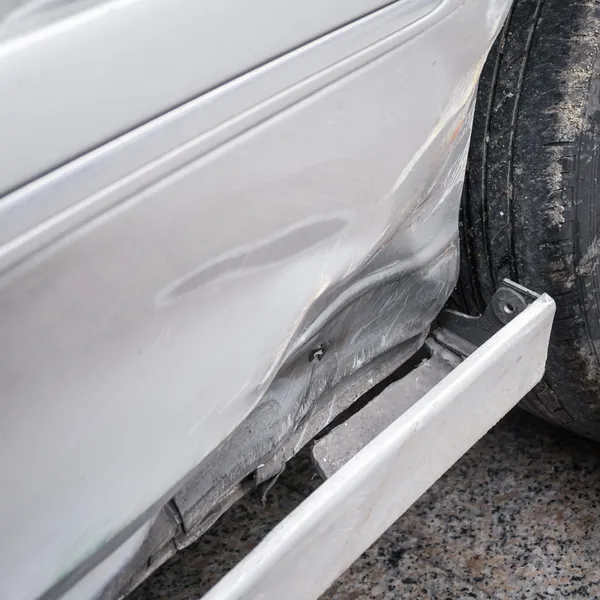 Car skirt damaged by accident — Stock Photo, Image