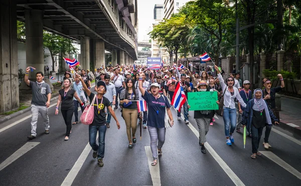 Protesters walking on the road