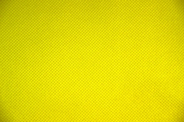 Тло текстури жовтого тканини — стокове фото