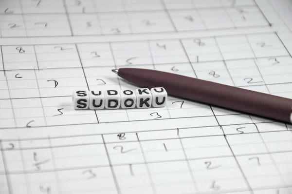 Sudoku spil og Pen - Stock-foto