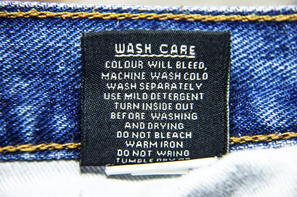 Specific instructions for washing Jeans — Stock Photo, Image