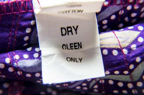 Wrong tag for dry-cleaning — Stock Photo, Image