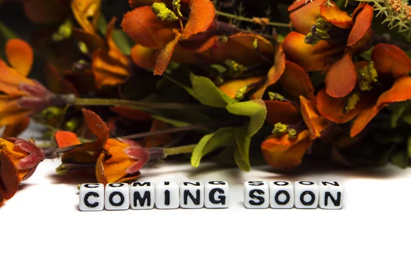 Coming soon message with colorful flowers — Stock Photo, Image