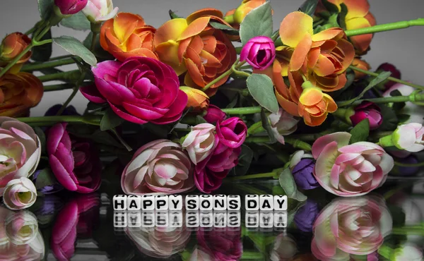 Happy sons day with flowers — Stock Photo, Image