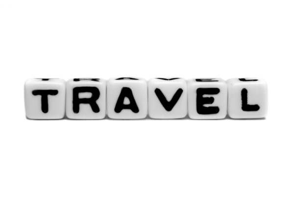 Travel text message with alphabets on white background.