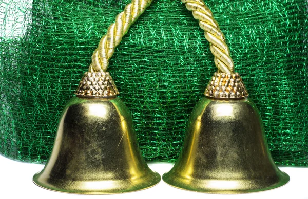 2 つの黄色の鐘と緑のメッシュ — ストック写真