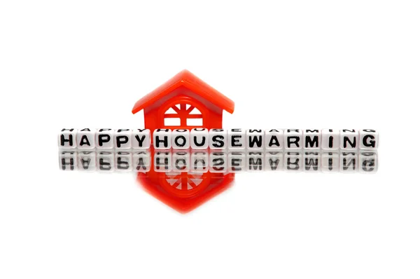 Housewarming message with red home — Stock Photo, Image