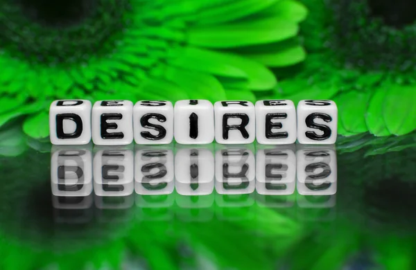 Desires text with green flowers — Stock Photo, Image