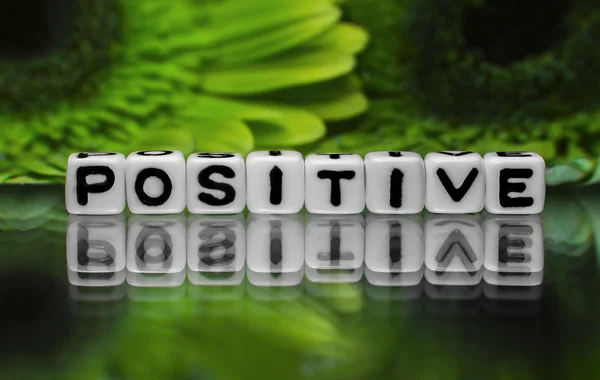 Positive text with green flowers — Stock Photo, Image