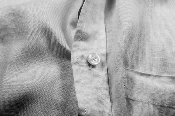 Button on white shirt — Stock Photo, Image