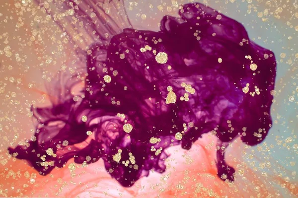Very thick ink in water and Alcohol ink fluid abstract texture fluid art with gold glitter and liquid with shades.