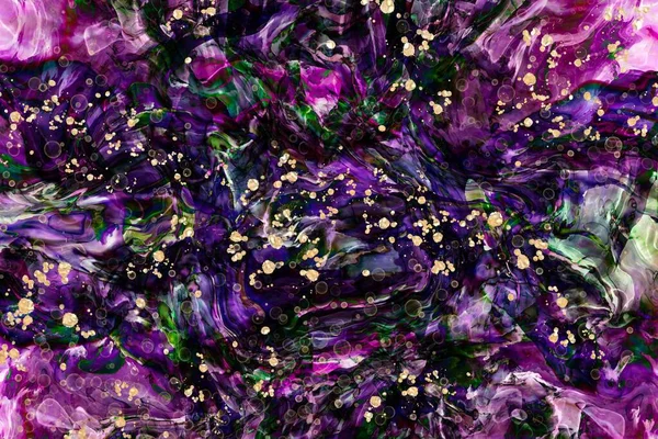 Deep purple and pink with golden dust on Alcohol ink fluid abstract texture fluid art with gold glitter and liquid with shades.
