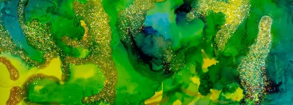 Patches of golden dust and lines on Alcohol ink fluid abstract texture fluid art with gold glitter and liquid with shades.