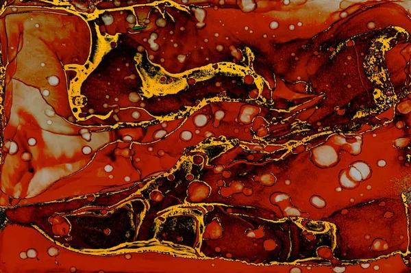 Floating gold powder on deep red Alcohol ink fluid abstract texture fluid art with gold glitter and liquid with shades.