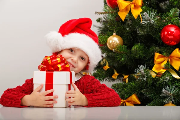 Little girl with gift box Royalty Free Stock Images
