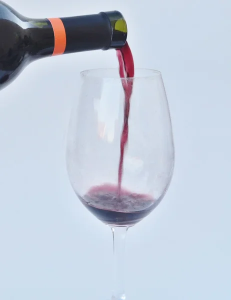 Pouring red wine. — Stock Photo, Image