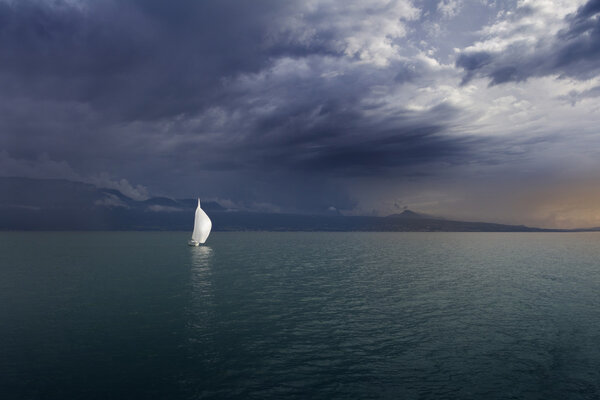 Boat on Lake Leman. Switzerland. Sunset