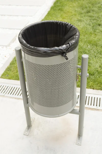 Metal trash can in the park — Stock Photo, Image